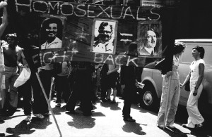 Protesters carrying banner with slogan 'homosexuals fight back', and images linking Anita Bryant, Mary Whitehouse and Adolf Hitler.