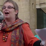 Clara Connolly of Women Against Fundamentalism, speaking at a Protest the Pope demonstration in London. From a photo by Helen Lowe.